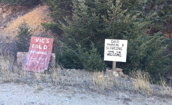 Signs at gold panning site
